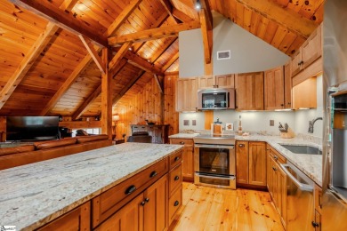 Discover mountain living at its finest with this timeless timber on The Cliffs at Glassy Golf and Country Club in South Carolina - for sale on GolfHomes.com, golf home, golf lot