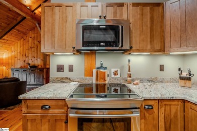 Discover mountain living at its finest with this timeless timber on The Cliffs at Glassy Golf and Country Club in South Carolina - for sale on GolfHomes.com, golf home, golf lot