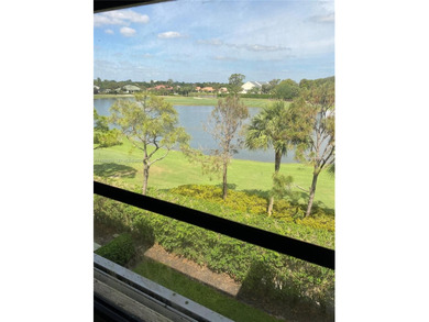 Large and bright condo. 2BR/2BA + extra large laundry room. All on Bear Lakes Country Club in Florida - for sale on GolfHomes.com, golf home, golf lot