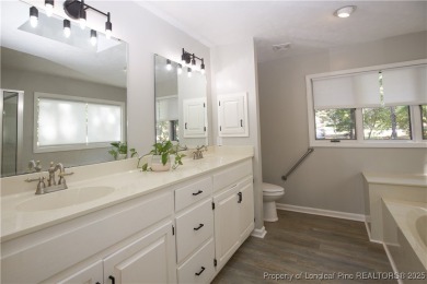 Welcome to this stunning 3-bedroom, 3-bath all-brick home on Woodlake Country Club in North Carolina - for sale on GolfHomes.com, golf home, golf lot