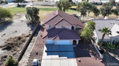 Beautiful 2 story home just off the 13th hole of the Huukan on Desert Lakes Golf Course in Arizona - for sale on GolfHomes.com, golf home, golf lot