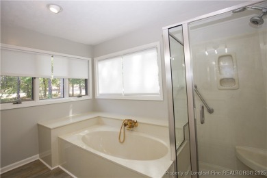 Welcome to this stunning 3-bedroom, 3-bath all-brick home on Woodlake Country Club in North Carolina - for sale on GolfHomes.com, golf home, golf lot