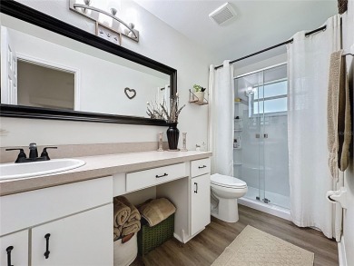 Walk into this modernized Canterbury model located in 55+ gated on Kings Ridge Golf Club in Florida - for sale on GolfHomes.com, golf home, golf lot