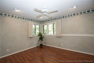 Welcome to this stunning 3-bedroom, 3-bath all-brick home on Woodlake Country Club in North Carolina - for sale on GolfHomes.com, golf home, golf lot