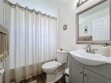 Walk into this modernized Canterbury model located in 55+ gated on Kings Ridge Golf Club in Florida - for sale on GolfHomes.com, golf home, golf lot