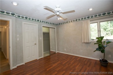 Welcome to this stunning 3-bedroom, 3-bath all-brick home on Woodlake Country Club in North Carolina - for sale on GolfHomes.com, golf home, golf lot