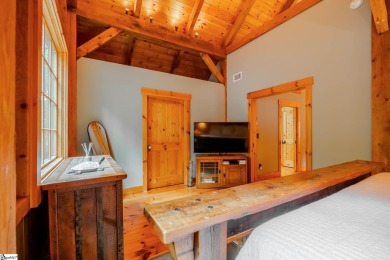 Discover mountain living at its finest with this timeless timber on The Cliffs at Glassy Golf and Country Club in South Carolina - for sale on GolfHomes.com, golf home, golf lot