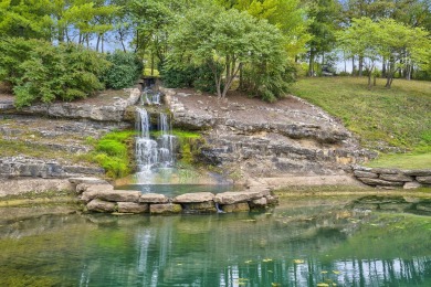 Gorgeous, almost level lot in the prestigious Stonebridge on Ledgestone Country Club and Golf Course in Missouri - for sale on GolfHomes.com, golf home, golf lot