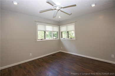 Welcome to this stunning 3-bedroom, 3-bath all-brick home on Woodlake Country Club in North Carolina - for sale on GolfHomes.com, golf home, golf lot