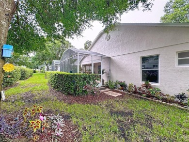 Walk into this modernized Canterbury model located in 55+ gated on Kings Ridge Golf Club in Florida - for sale on GolfHomes.com, golf home, golf lot