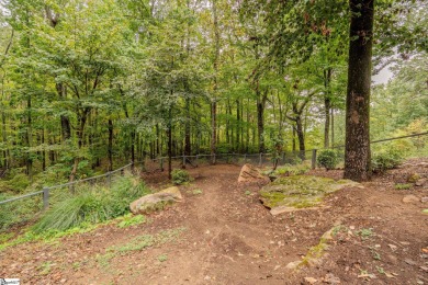 Discover mountain living at its finest with this timeless timber on The Cliffs at Glassy Golf and Country Club in South Carolina - for sale on GolfHomes.com, golf home, golf lot