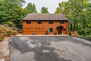 Discover mountain living at its finest with this timeless timber on The Cliffs at Glassy Golf and Country Club in South Carolina - for sale on GolfHomes.com, golf home, golf lot
