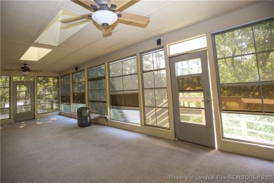 Welcome to this stunning 3-bedroom, 3-bath all-brick home on Woodlake Country Club in North Carolina - for sale on GolfHomes.com, golf home, golf lot