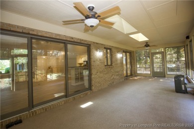 Welcome to this stunning 3-bedroom, 3-bath all-brick home on Woodlake Country Club in North Carolina - for sale on GolfHomes.com, golf home, golf lot