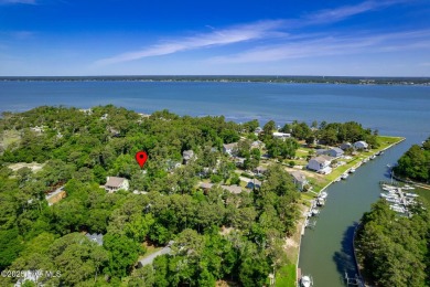 This charming 3-bedroom, 2-bath home is nestled in the desirable on The Country Club of the Crystal Coast in North Carolina - for sale on GolfHomes.com, golf home, golf lot