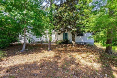 This charming 3-bedroom, 2-bath home is nestled in the desirable on The Country Club of the Crystal Coast in North Carolina - for sale on GolfHomes.com, golf home, golf lot