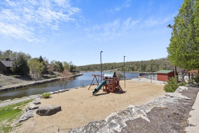 Gorgeous, almost level lot in the prestigious Stonebridge on Ledgestone Country Club and Golf Course in Missouri - for sale on GolfHomes.com, golf home, golf lot