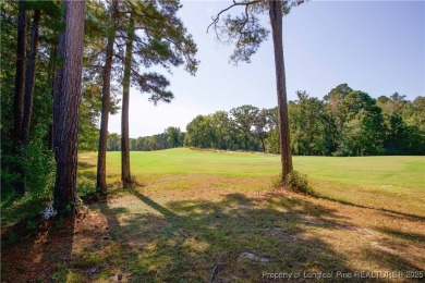 Welcome to this stunning 3-bedroom, 3-bath all-brick home on Woodlake Country Club in North Carolina - for sale on GolfHomes.com, golf home, golf lot