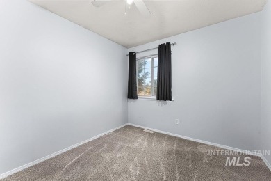A charming home on a spacious lot in a well-established on Centennial Golf Course in Idaho - for sale on GolfHomes.com, golf home, golf lot