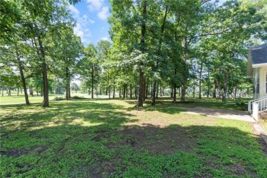 Welcome home to this beautiful 3-bedroom, 2-bath, single-level on Holiday Island Golf Course in Arkansas - for sale on GolfHomes.com, golf home, golf lot