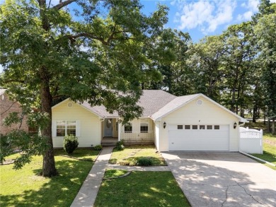 Welcome home to this beautiful 3-bedroom, 2-bath, single-level on Holiday Island Golf Course in Arkansas - for sale on GolfHomes.com, golf home, golf lot