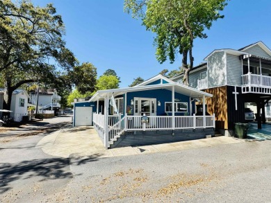2 BED/2 BATH BEACH HOUSE IN OCEAN LAKES WITH WRAPAROUND COVERED on Prestwick Country Club in South Carolina - for sale on GolfHomes.com, golf home, golf lot