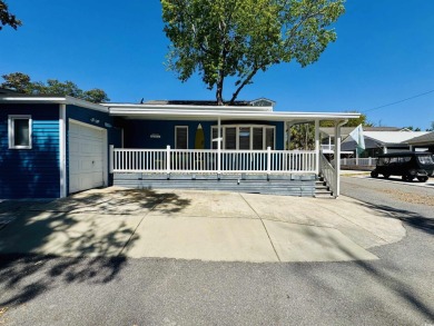 2 BED/2 BATH BEACH HOUSE IN OCEAN LAKES WITH WRAPAROUND COVERED on Prestwick Country Club in South Carolina - for sale on GolfHomes.com, golf home, golf lot
