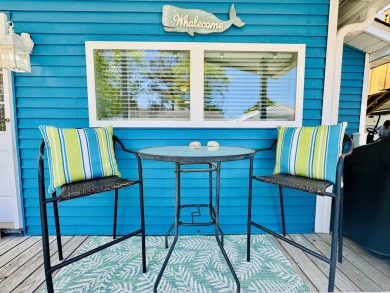 2 BED/2 BATH BEACH HOUSE IN OCEAN LAKES WITH WRAPAROUND COVERED on Prestwick Country Club in South Carolina - for sale on GolfHomes.com, golf home, golf lot
