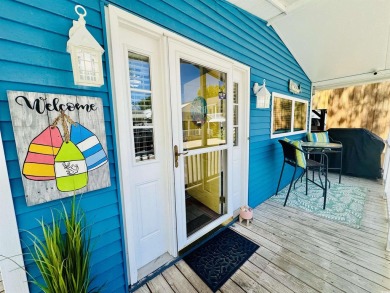 2 BED/2 BATH BEACH HOUSE IN OCEAN LAKES WITH WRAPAROUND COVERED on Prestwick Country Club in South Carolina - for sale on GolfHomes.com, golf home, golf lot