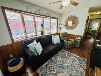 2 BED/2 BATH BEACH HOUSE IN OCEAN LAKES WITH WRAPAROUND COVERED on Prestwick Country Club in South Carolina - for sale on GolfHomes.com, golf home, golf lot