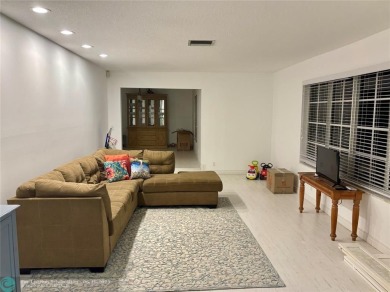 Stunning 4-Bedroom, 4-Bathroom Home on Coral Springs Country on Country Club of Coral Springs in Florida - for sale on GolfHomes.com, golf home, golf lot