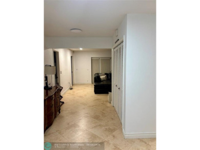Stunning 4-Bedroom, 4-Bathroom Home on Coral Springs Country on Country Club of Coral Springs in Florida - for sale on GolfHomes.com, golf home, golf lot