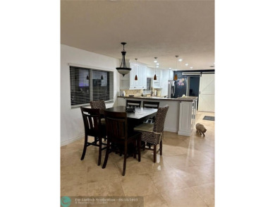 Stunning 4-Bedroom, 4-Bathroom Home on Coral Springs Country on Country Club of Coral Springs in Florida - for sale on GolfHomes.com, golf home, golf lot