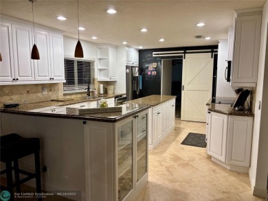 Stunning 4-Bedroom, 4-Bathroom Home on Coral Springs Country on Country Club of Coral Springs in Florida - for sale on GolfHomes.com, golf home, golf lot