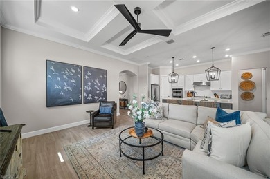 Built in 2022, this light-filled *Summerwood* floorplan home on Calusa Pines Golf Club in Florida - for sale on GolfHomes.com, golf home, golf lot