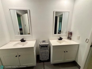 Stunning 4-Bedroom, 4-Bathroom Home on Coral Springs Country on Country Club of Coral Springs in Florida - for sale on GolfHomes.com, golf home, golf lot