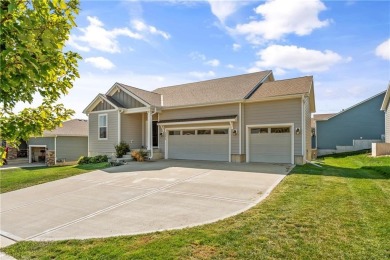 Welcome home to this stunning Reverse 1.5 Story in the coveted on Prairie Highlands Golf Course in Kansas - for sale on GolfHomes.com, golf home, golf lot