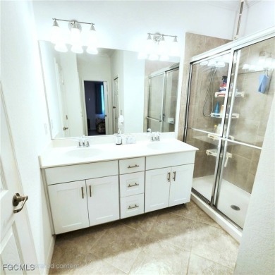 This beautifully maintained 3-bedroom, 2.5-bath townhouse offers on Gateway Golf and Country Club in Florida - for sale on GolfHomes.com, golf home, golf lot