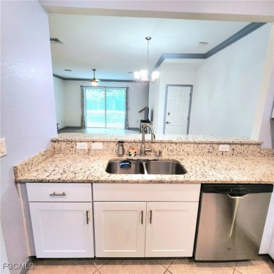 This beautifully maintained 3-bedroom, 2.5-bath townhouse offers on Gateway Golf and Country Club in Florida - for sale on GolfHomes.com, golf home, golf lot
