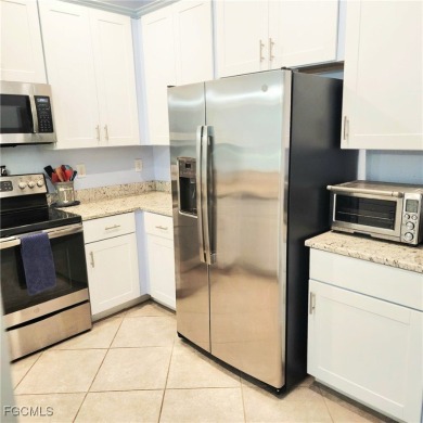 This beautifully maintained 3-bedroom, 2.5-bath townhouse offers on Gateway Golf and Country Club in Florida - for sale on GolfHomes.com, golf home, golf lot