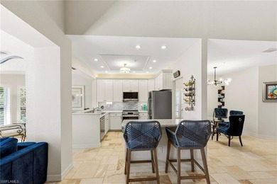 Rarely available and beautifully updated 2nd floor coach home in on The Colony Golf and Country Club in Florida - for sale on GolfHomes.com, golf home, golf lot