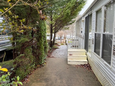 Deeded RV Lot For Sale WOW here is your chance to own a RV lot on Bent Creek Golf Course in Tennessee - for sale on GolfHomes.com, golf home, golf lot