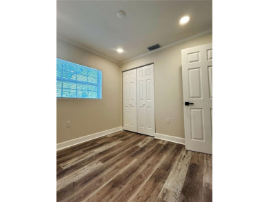 Welcome to this beautifully renovated 4-bedroom, 2-bathroom on Rocky Point Golf Course in Florida - for sale on GolfHomes.com, golf home, golf lot