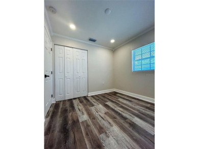Welcome to this beautifully renovated 4-bedroom, 2-bathroom on Rocky Point Golf Course in Florida - for sale on GolfHomes.com, golf home, golf lot