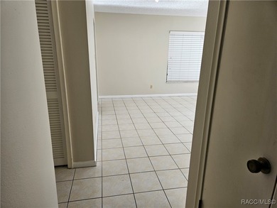 55 Chinaberry Circle is a charming single-family home located on on Sugarmill Woods Golf and Country Club in Florida - for sale on GolfHomes.com, golf home, golf lot