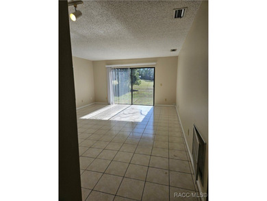 55 Chinaberry Circle is a charming single-family home located on on Sugarmill Woods Golf and Country Club in Florida - for sale on GolfHomes.com, golf home, golf lot