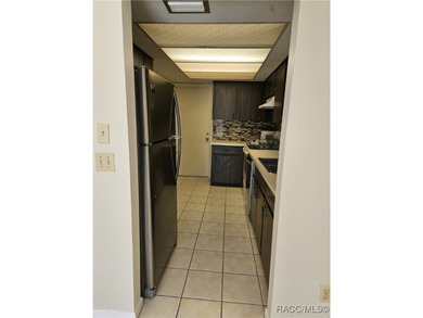 55 Chinaberry Circle is a charming single-family home located on on Sugarmill Woods Golf and Country Club in Florida - for sale on GolfHomes.com, golf home, golf lot