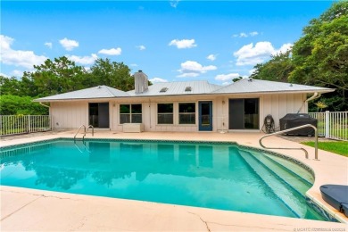Golf Course Home in Desirable Crane Creek! Set on a spacious 1 on Martin Downs Country Club in Florida - for sale on GolfHomes.com, golf home, golf lot