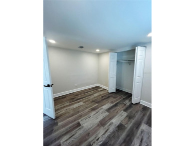 Welcome to this beautifully renovated 4-bedroom, 2-bathroom on Rocky Point Golf Course in Florida - for sale on GolfHomes.com, golf home, golf lot