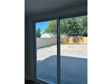 Welcome to this beautifully renovated 4-bedroom, 2-bathroom on Rocky Point Golf Course in Florida - for sale on GolfHomes.com, golf home, golf lot